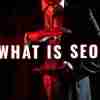 man holding a what is seo sign in his hands